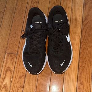 Nike Black Athletic Running Shoes with White Swoosh